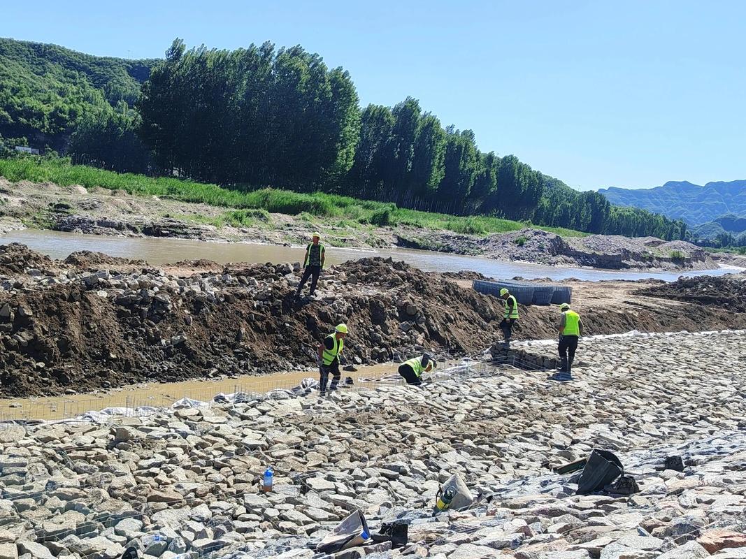 Gabion basket installation for riverbank protection in Philippines